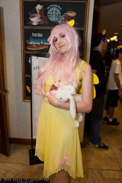 Size: 1365x2048 | Tagged: artist needed, safe, derpibooru import, angel bunny, fluttershy, human, convention, cosplay, irl, irl human, nan desu kan, nan desu kan 2013, photo, plushie, solo
