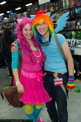 Size: 1365x2048 | Tagged: artist needed, safe, derpibooru import, pinkie pie, rainbow dash, human, clothes, convention, cosplay, edmonton expo, edmonton expo 2013, fingerless gloves, gloves, goggles, irl, irl human, photo