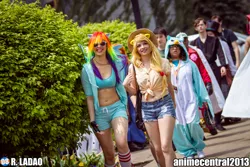 Size: 2048x1365 | Tagged: anime central, anime central 2013, applejack, belly button, bellyring, clothes, convention, cosplay, derpibooru import, fingerless gloves, front knot midriff, gloves, human, irl, irl human, midriff, photo, rainbow dash, safe