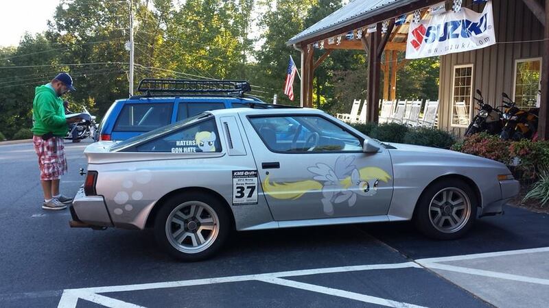 Size: 960x540 | Tagged: car, decal, derpibooru import, derpy hooves, haters gonna hate, human, irl, irl human, itasha, mitsubishi, mitsubishi starion, photo, safe