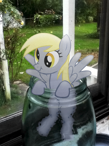 Size: 500x667 | Tagged: safe, artist:diablo, derpibooru import, derpy hooves, pegasus, pony, female, irl, jar, mare, micro, photo, ponies in real life, scrunchy face, solo