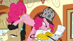 Size: 1050x590 | Tagged: safe, derpibooru import, screencap, gustave le grande, mulia mild, pinkie pie, donkey, earth pony, gryphon, hybrid, mule, pony, mmmystery on the friendship express, bug eyes, deerstalker, ear piercing, earring, eye contact, female, glare, hat, jewelry, looking at each other, male, mare, piercing, toque, trio