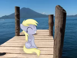 Size: 2304x1728 | Tagged: artist:anevilzebra, artist:missbeigepony, boat, cloud, cute, derpibooru import, derpy hooves, eyes closed, filly, grin, irl, mountain, ocean, photo, pier, ponies in real life, safe, sitting, sky, smiling, solo, vector, water