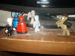 Size: 640x480 | Tagged: angel, angels, cyberman, dalek, daleks, derpibooru import, doctor whooves, dust, irl, photo, ponies in real life, safe, silent, time turner, toy, weeping, weeping angel, weeping angels