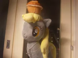 Size: 500x375 | Tagged: safe, artist:onlyfactory, derpibooru import, derpy hooves, pegasus, pony, bootleg, female, irl, mare, muffin, necklace, photo, plushie, toy, waifu, window