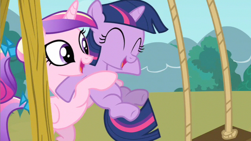 Size: 853x480 | Tagged: safe, derpibooru import, screencap, princess cadance, twilight sparkle, pony, a canterlot wedding, duo, eyes closed, female, filly, filly twilight sparkle, foalsitter, holding a pony, swing, swing set, teen princess cadance, younger