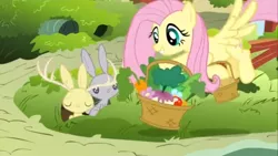 Size: 1366x768 | Tagged: safe, derpibooru import, screencap, fluttershy, jackalope, pegasus, pony, rabbit, filli vanilli, animal, basket, feeding, female, food, mare, vegetables, working