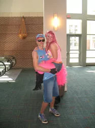 Size: 1280x1707 | Tagged: safe, artist:chatooka, derpibooru import, pinkie pie, rainbow dash, human, carrying, convention, cosplay, couple, half r63 shipping, holding, irl, irl human, midwest brony fest, midwest brony fest 2013, photo, pinkieblitz, pinkiedash, rainbow blitz, rule 63, shipping
