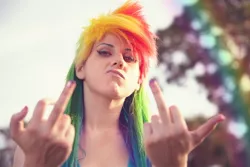 Size: 1280x853 | Tagged: safe, artist:norikat, derpibooru import, rainbow dash, human, cosplay, irl, irl human, middle finger, photo, solo, vulgar