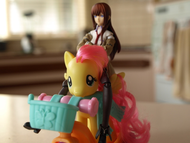 Size: 3648x2736 | Tagged: basket, boots, brushable, clothes, crossover, derpibooru import, figma, fluttershy, irl, makise kurisu, necktie, photo, pink mane, red hair, riding, safe, scarf, scooter, steins;gate, toy, toy pony cavalry