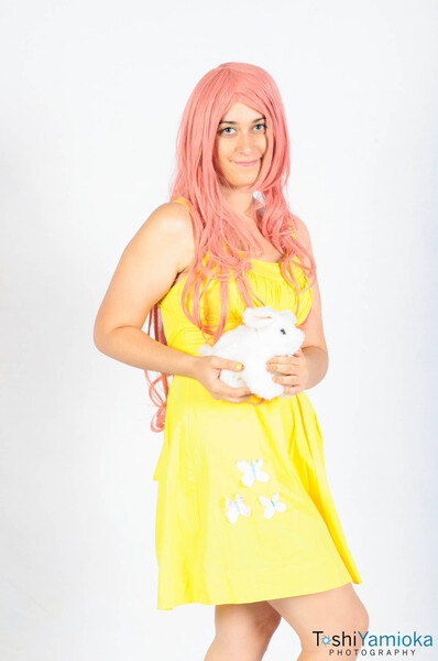 Size: 1275x1920 | Tagged: artist needed, safe, artist:toshiyamioka, derpibooru import, fluttershy, human, 2012, cosplay, irl, irl human, photo, plushie, saboten con, solo