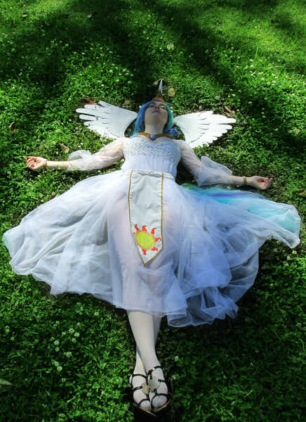 Size: 2624x3615 | Tagged: safe, artist:vampire-sacrifice, derpibooru import, princess celestia, human, cosplay, grass, irl, irl human, on back, photo, solo