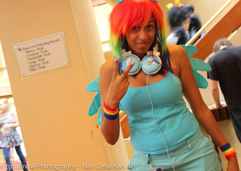 Size: 2048x1456 | Tagged: artist needed, safe, derpibooru import, rainbow dash, human, 2013, convention, cosplay, headphones, irl, irl human, ndk, photo, solo, wristband