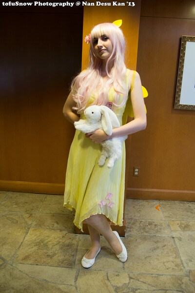 Size: 1365x2048 | Tagged: artist needed, safe, derpibooru import, fluttershy, human, 2013, convention, cosplay, irl, irl human, nan desu kan, ndk, photo, plushie, solo
