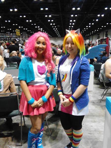 Size: 449x599 | Tagged: safe, derpibooru import, pinkie pie, rainbow dash, human, equestria girls, clothes, convention, cosplay, costume, duet, equestria girls outfit, irl, irl human, megacon, megacon 2014, photo