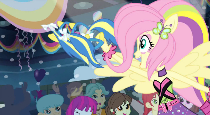 Size: 852x468 | Tagged: safe, derpibooru import, screencap, brawly beats, bright idea, curly winds, drama letter, fluttershy, mystery mint, nolan north, some blue guy, sophisticata, teddy t. touchdown, velvet sky, watermelody, equestria girls, rainbow rocks, shake your tail, background human, crowd, cute, female, huggable, male, ponied up, shyabetes