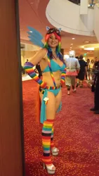 Size: 1082x1920 | Tagged: armpits, arm warmers, artifact, artist:salaciouseos, belly button, belt, bikini, clothes, cosplay, cutie mark, derpibooru import, dragoncon, goggles, high heels, human, irl, irl human, leg warmers, photo, rainbow dash, rainbow socks, safe, socks, striped socks, suspenders, swimsuit