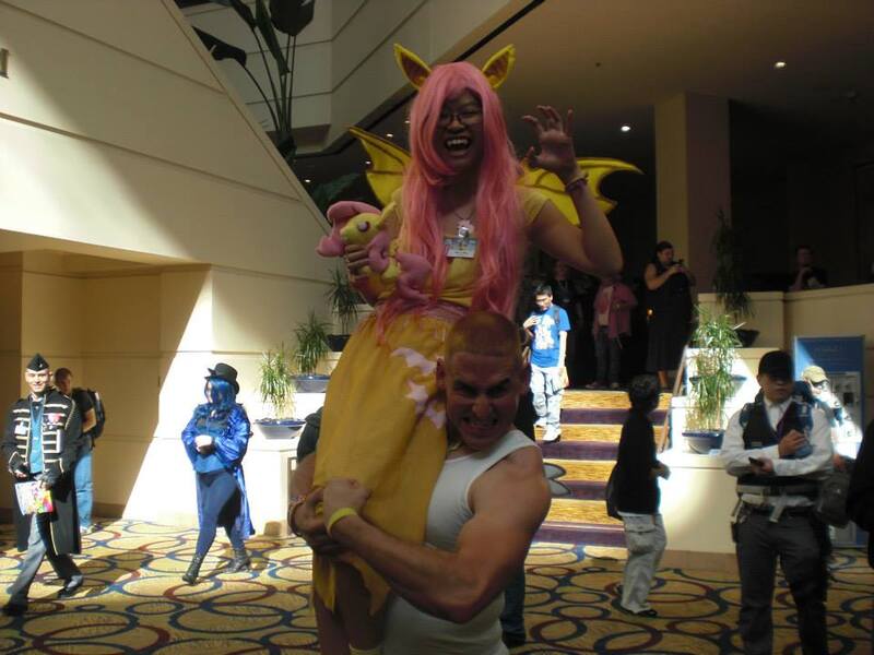 Size: 960x720 | Tagged: 2014, artist:bunnygirl2190, artist:jamesalpha, babscon, bulk biceps, carrying, convention, cosplay, derpibooru import, flutterbat, fluttershy, human, implied flutterbulk, implied shipping, irl, irl human, photo, roid rage, safe