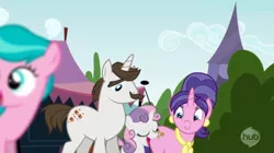 Size: 610x342 | Tagged: aquamarine, cookie crumbles, cookieflanks, derpibooru import, father and daughter, hondo flanks, hub logo, inspiration manifestation, mother and daughter, rarity's parents, safe, screencap, smiling, sweetie belle