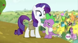 Size: 854x474 | Tagged: safe, derpibooru import, screencap, rarity, spike, dragon, pony, unicorn, inspiration manifestation, duo, female, golden road, hub logo, hug, male, mare, saddle bag, stoner spike