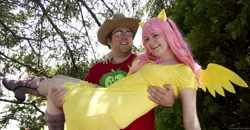 Size: 1000x519 | Tagged: artist needed, safe, derpibooru import, big macintosh, fluttershy, human, 2013, carrying, convention, cosplay, female, fluttermac, irl, irl human, male, photo, portcon, portcon 2013, shipping, straight