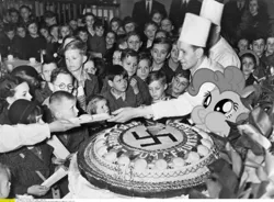 Size: 520x382 | Tagged: black and white, cake, derpibooru import, grayscale, human, irl, irl human, monochrome, nazi, photo, pinkie pie, ponies in real life, safe, swastika