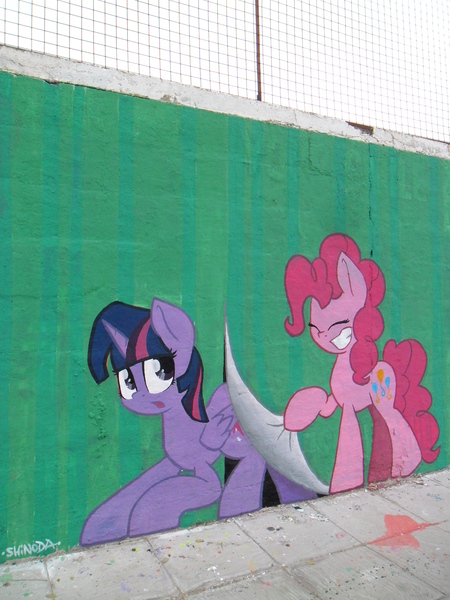 Size: 2448x3264 | Tagged: safe, artist:shinodage, derpibooru import, pinkie pie, twilight sparkle, twilight sparkle (alicorn), alicorn, pony, :o, breaking the fourth wall, eyes closed, female, fourth wall, graffiti, grin, hoof hold, mare, photo, smiling