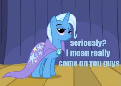 Size: 505x360 | Tagged: safe, derpibooru import, edit, edited screencap, screencap, trixie, pony, unicorn, boast busters, blue text, cape, caption, clothes, cropped, female, frown, image macro, lidded eyes, looking at you, mare, meme, raised eyebrow, solo, text, trixie yells at everything, trixie's cape, unamused