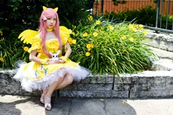 Size: 900x600 | Tagged: artist needed, safe, derpibooru import, angel bunny, fluttershy, human, 2012, animenext, choker, clothes, convention, cosplay, dress, high heels, irl, irl human, photo, sitting, solo