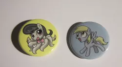 Size: 900x497 | Tagged: safe, artist:johnjoseco, derpibooru import, derpy hooves, pegasus, pony, button, buttons, female, mare, octaviapus