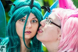 Size: 2048x1365 | Tagged: safe, artist:asiamartinez, artist:chibi chuu, derpibooru import, photographer:travis photography, queen chrysalis, oc, oc:fluffle puff, human, canon x oc, chrysipuff, cosplay, female, irl, irl human, lesbian, licking, licking lips, photo, queen chrysalis is not amused, shipping, tongue out, unamused