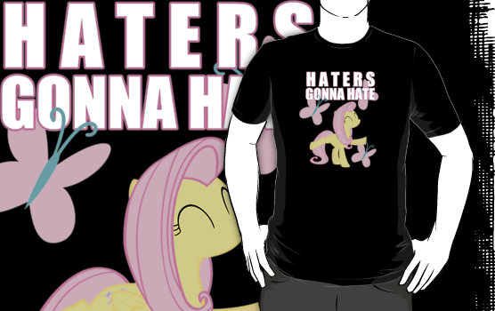 Size: 556x350 | Tagged: artist:northerndash, clothes, cutie mark, derpibooru import, fluttershy, haters gonna hate, merchandise, redbubble, safe, shirt, solo, text