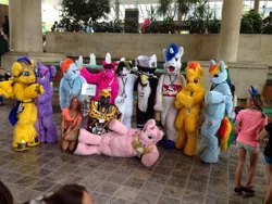 Size: 960x720 | Tagged: berry punch, berryshine, bronycon, bumblebee, cosplay, derpibooru import, flash sentry, fursuit, gustave le grande, hasbro, hubble, human, irl, irl human, oc, oc:fluffle puff, oc:trance sequence, photo, photobomb, rainbow dash, safe, shining armor, spitfire, transformers, twilight sparkle