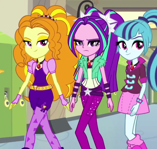 Size: 720x683 | Tagged: safe, derpibooru import, screencap, adagio dazzle, aria blaze, sonata dusk, equestria girls, rainbow rocks, canterlot high, gem, hallway, lockers, looking at you, pigtails, ponytail, resting bitch face, siren gem, smiling, smirk, spiked wristband, the dazzlings, twintails, wristband