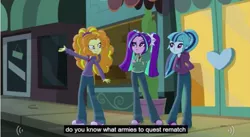 Size: 851x468 | Tagged: safe, derpibooru import, screencap, adagio dazzle, aria blaze, sonata dusk, equestria girls, rainbow rocks, clothes, gem, hoodie, jewelry, meme, necklace, outdoors, sidewalk, siren gem, the dazzlings, youtube caption