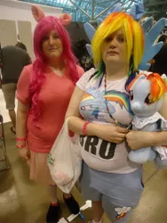 Size: 3240x4320 | Tagged: build-a-bear, cosplay, derpibooru import, fan expo canada, human, irl, irl human, photo, pinkie pie, plushie, rainbow dash, safe