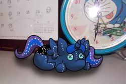 Size: 655x437 | Tagged: artist:karlaandbliss, calendar, clock, derpibooru import, doraemon, irl, lunadoodle, photo, plushie, princess luna, safe