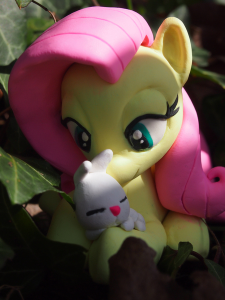 Size: 3024x4032 | Tagged: angel bunny, artist:dustysculptures, bedroom eyes, craft, cuddling, cute, derpibooru import, fluttershy, hug, irl, photo, prone, safe, sculpture, shyabetes, sleeping, smiling, snuggling, toy