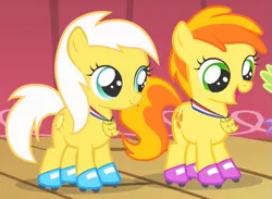 Size: 579x423 | Tagged: safe, derpibooru import, screencap, peachy pie, sunny daze, earth pony, pony, the show stoppers, background pony, cropped, duo focus, female, filly, medal, roller skates