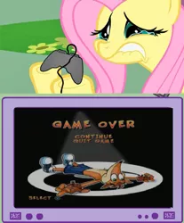 Size: 845x1023 | Tagged: safe, derpibooru import, fluttershy, pegasus, pony, controller, crash bandicoot, crash twinsanity, exploitable meme, gamershy, lip bite, meme, obligatory pony, sad, teary eyes, tv meme