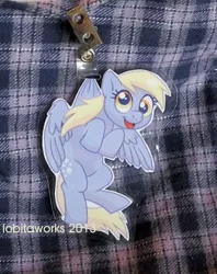 Size: 570x720 | Tagged: safe, artist:lobitaworks, derpibooru import, derpy hooves, pegasus, pony, badge, con badge, female, hanging, irl, mare, merchandise, photo