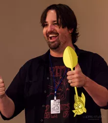 Size: 900x1024 | Tagged: derpibooru import, human, irl, irl human, m.a. larson, photo, safe, scepter, spoon, with cake