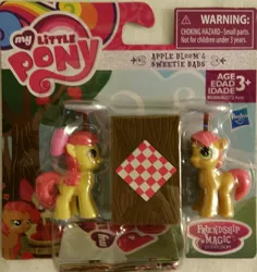 Size: 1410x1494 | Tagged: apple bloom, babs seed, blind bag, derpibooru import, plate, plate spinning, safe, sweet apple acres, sweetie babs, table, tablecloth, toy, you had one job