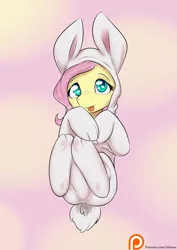 Size: 1100x1550 | Tagged: safe, artist:alasou, deleted from derpibooru, derpibooru import, fluttershy, :p, bunny costume, clothes, costume, cute, kigurumi, looking at you, on back, patreon, patreon logo, shyabetes, smiling, solo, tongue out