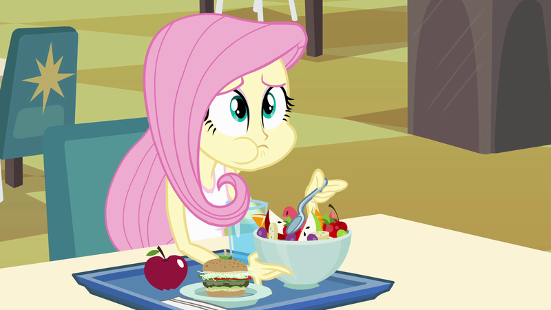 Size: 1280x720 | Tagged: safe, derpibooru import, screencap, fluttershy, equestria girls, apple, aweeg*, burger, eating, food, fruit salad, hamburger, left handed, lunch, tray