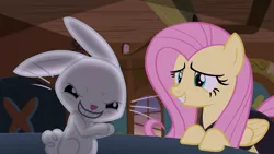 Size: 1280x720 | Tagged: safe, derpibooru import, screencap, angel bunny, fluttershy, pegasus, pony, rabbit, scare master, angel is a bunny bastard, duo, evil grin, female, grin, male, mare, pure unfiltered evil, smiling