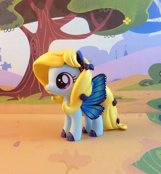 Size: 832x900 | Tagged: safe, artist:krowzivitch, derpibooru import, oc, oc:blue peleide, unofficial characters only, butterfly pony, original species, pony, bow, butterfly wings, craft, female, figurine, filly, hair bow, sculpture