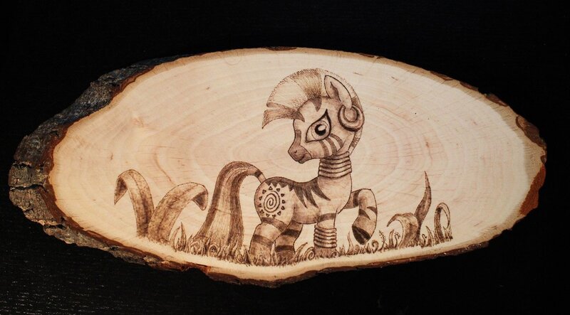 Size: 1280x708 | Tagged: artist:horseez, craft, derpibooru import, log, monochrome, pyrography, safe, solo, traditional art, tree stump, wood, woodwork, zebra, zecora