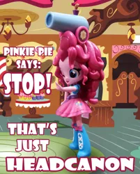 Size: 918x1140 | Tagged: safe, artist:texasuberalles, derpibooru import, pinkie pie, human, equestria girls, clothes, doll, equestria girls minis, eqventures of the minis, headcannon, headcanon, irl, party cannon, photo, pun, skirt, solo, sugarcube corner, toy, visual pun, wink