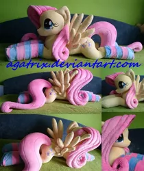 Size: 1024x1219 | Tagged: artist:agatrix, clothes, derpibooru import, fluttershy, irl, photo, plushie, safe, socks, solo, striped socks